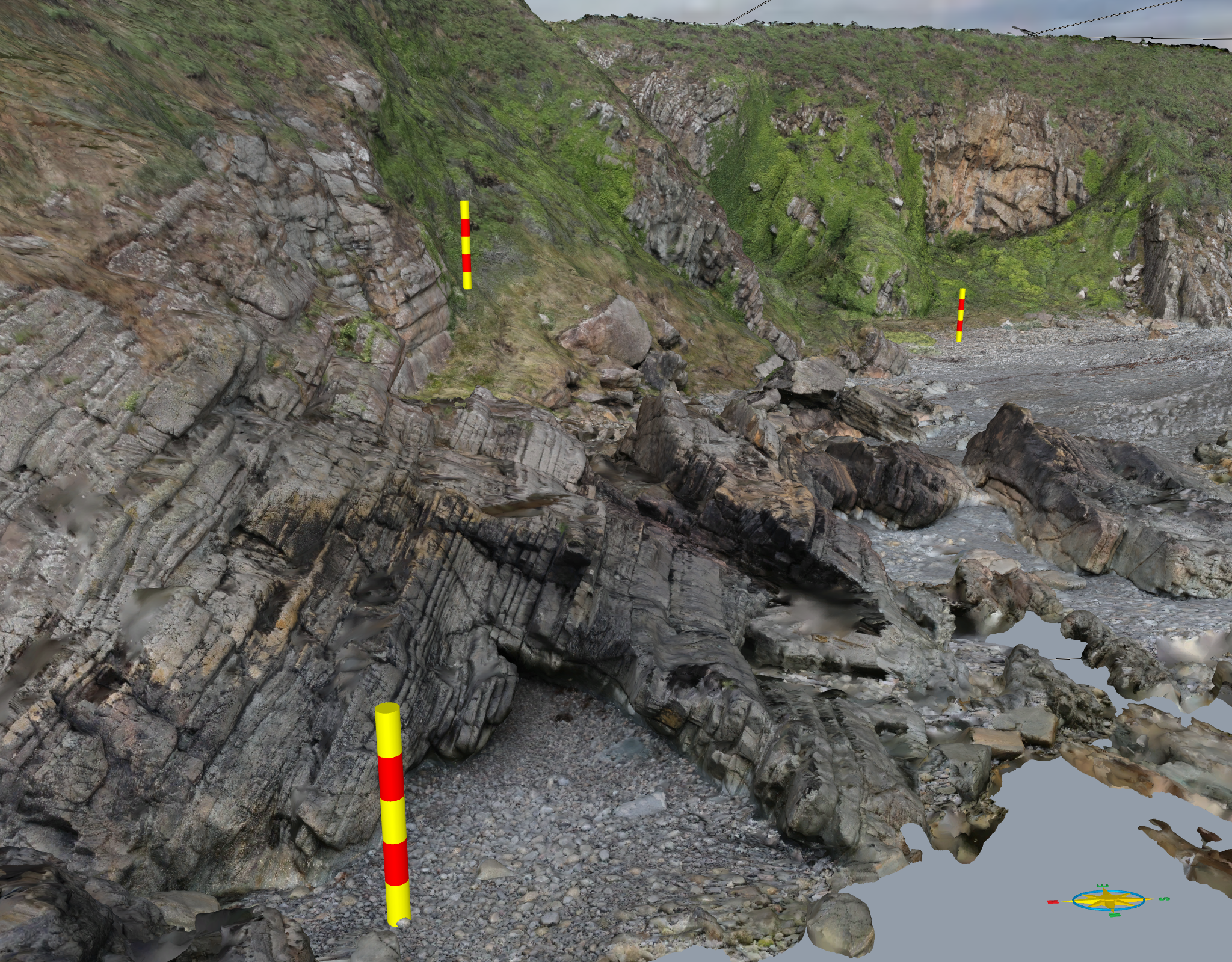 Greywackes and interbedded mudstones of the Silurian Carghidown Formation. The scale bars are 5.0m